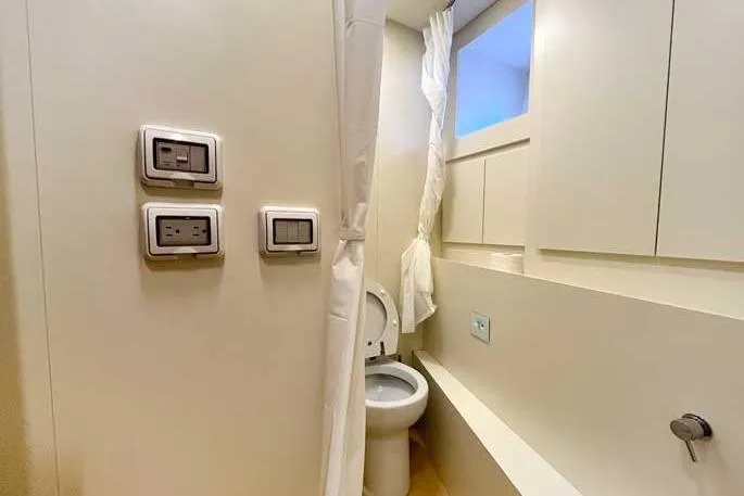  Yacht Photos Pics Bathroom interior of 2020 Ferretti Yachts 850, featuring modern fixtures and minimalist design.