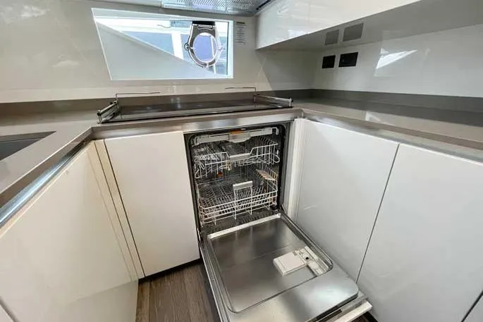  Yacht Photos Pics Modern kitchen with open dishwasher on 2020 Ferretti Yachts 850.