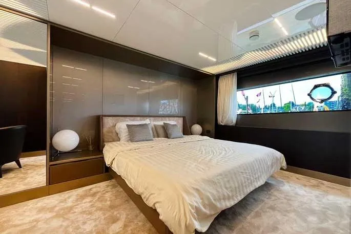  Yacht Photos Pics Luxurious bedroom interior of 2020 Ferretti Yachts 850 with modern design and elegant decor.
