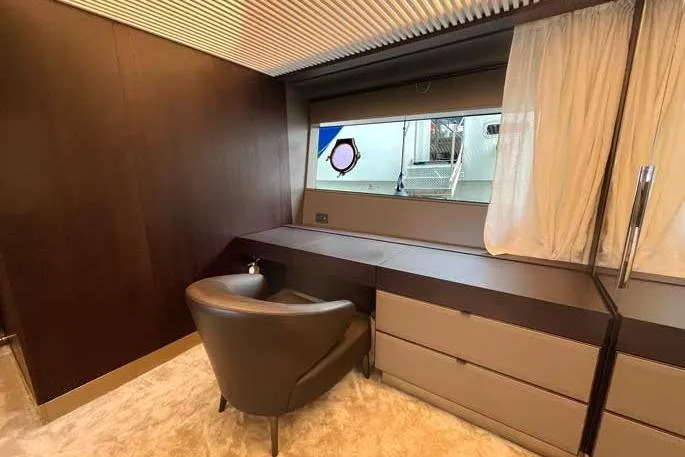  Yacht Photos Pics Luxurious interior of 2020 Ferretti Yachts 850 with elegant seating and window view.