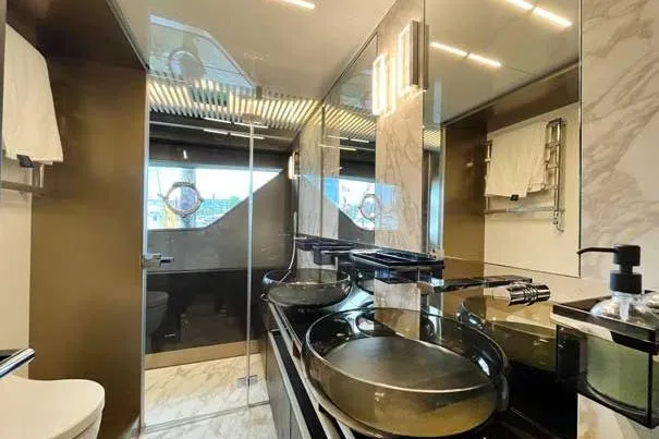  Yacht Photos Pics Luxurious bathroom in 2020 Ferretti Yachts 850 with modern fixtures and elegant design.
