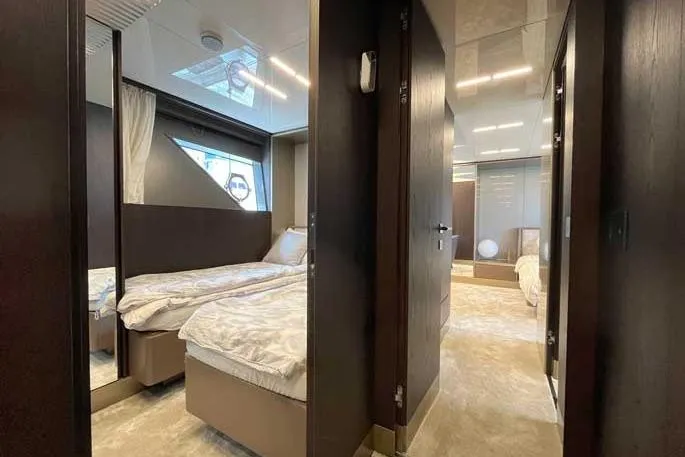  Yacht Photos Pics Luxurious interior of 2020 Ferretti Yachts 850, featuring elegant twin bedrooms.