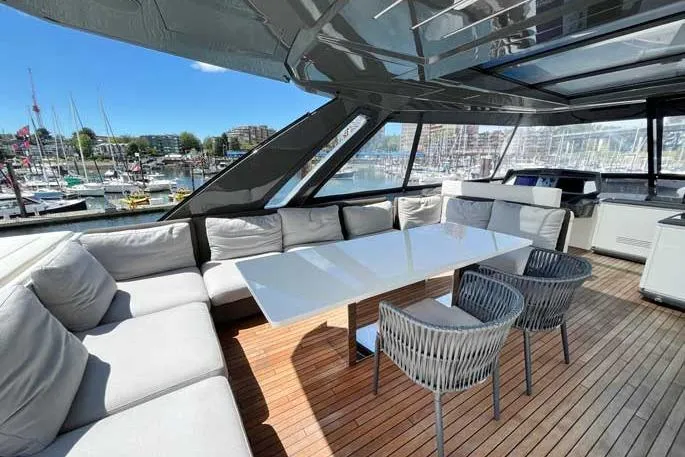  Yacht Photos Pics Luxurious 2020 Ferretti Yachts 850 with elegant outdoor seating and dining area.