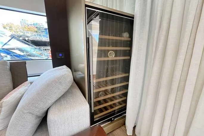  Yacht Photos Pics Luxurious interior of 2020 Ferretti Yachts 850 featuring a sleek wine cooler.