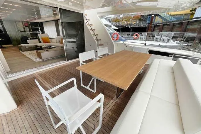  Yacht Photos Pics Luxurious 2020 Ferretti Yachts 850 with elegant outdoor seating and modern interior design.