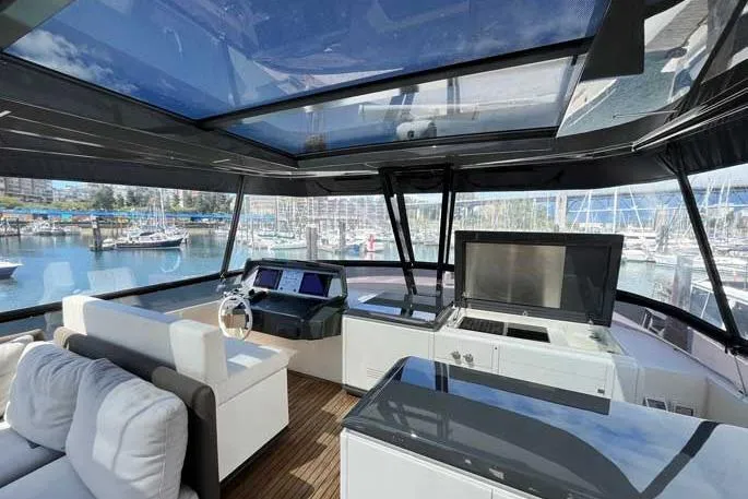  Yacht Photos Pics Luxurious 2020 Ferretti Yachts 850 interior with modern helm and panoramic views.