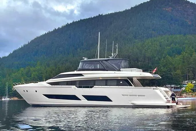  Yacht Photos Pics 2020 Ferretti Yachts 850 docked in scenic mountain marina.
