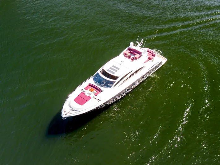  Yacht Photos Pics Sunseeker Predator 84 yacht cruising on open water, 2013 model, aerial view.