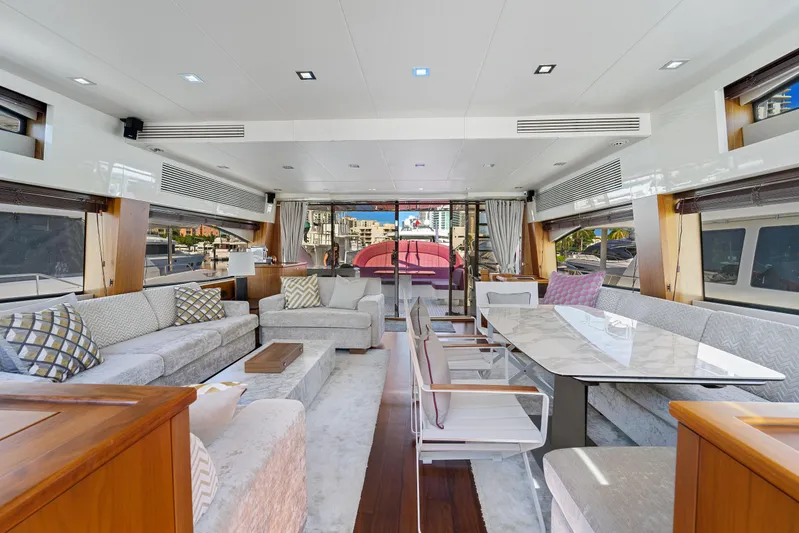  Yacht Photos Pics Luxurious interior of a 2013 Sunseeker Predator 84 yacht with elegant seating and dining area.