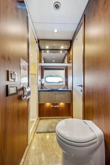  Yacht Photos Pics Luxurious bathroom in 2013 Sunseeker Predator 84 yacht with modern fixtures.