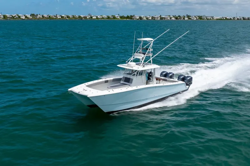  Yacht Photos Pics 2018 Freeman 37 VH boat cruising on open water with four engines.