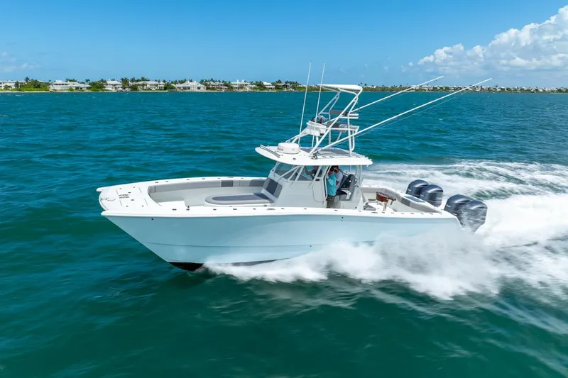  Yacht Photos Pics Freeman 37 VH 2018 boat cruising on blue ocean under clear sky.