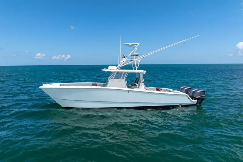  Yacht Photos Pics 2018 Freeman 37 VH boat on open sea under clear blue sky.