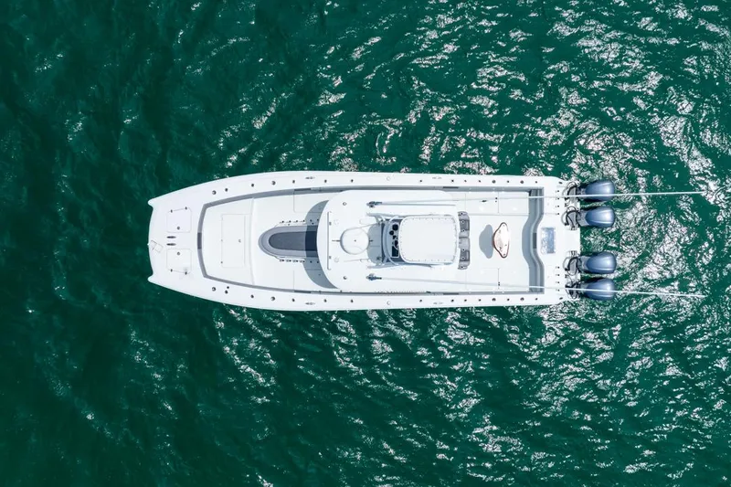  Yacht Photos Pics Aerial view of 2018 Freeman 37 VH boat on vibrant ocean water.