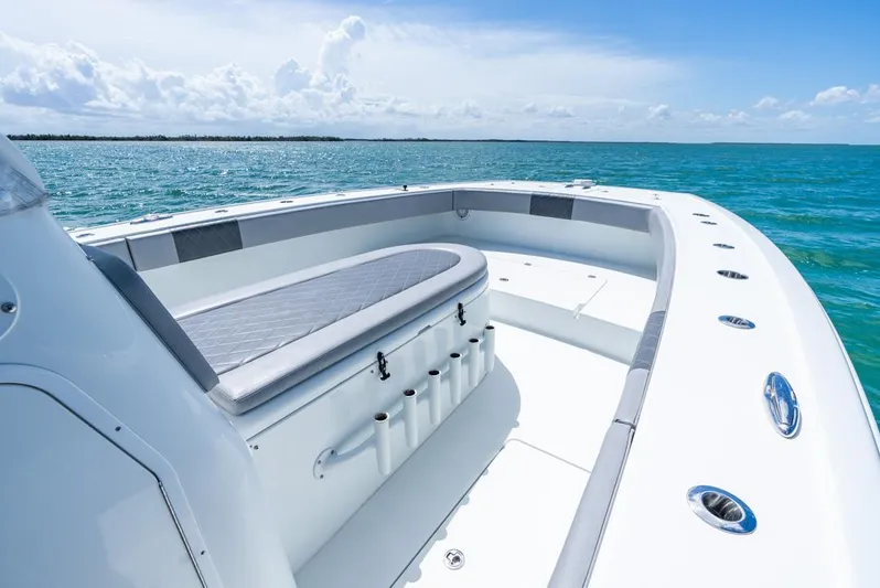  Yacht Photos Pics Freeman 37 VH 2018 boat interior with ocean view, featuring seating and rod holders.