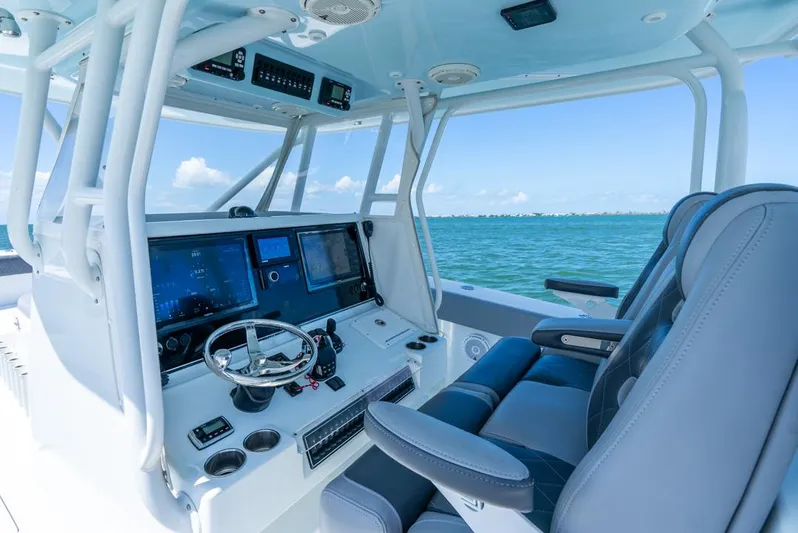  Yacht Photos Pics 2018 Freeman 37 VH boat cockpit with modern navigation system and ocean view.