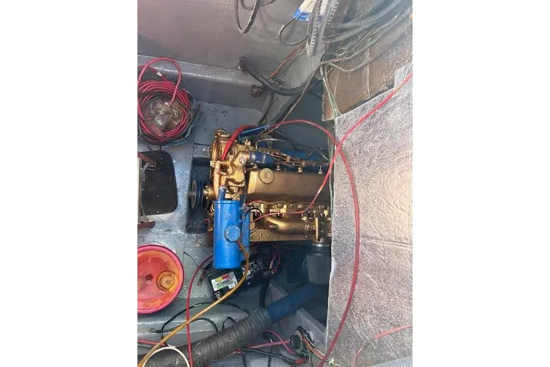 Liahona Yacht Photos Pics Engine compartment of a 1985 Custom model 60 with visible wiring and components.