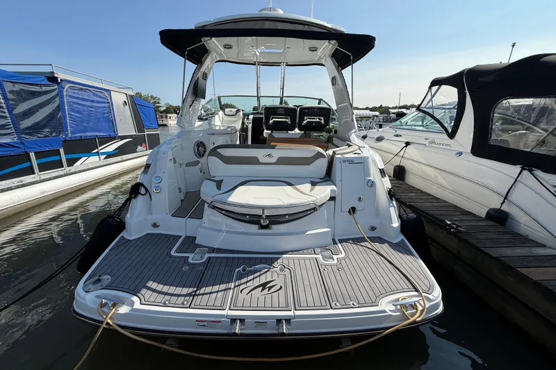  Yacht Photos Pics 2018 Monterey 355 Sport Yacht docked at marina, rear view.