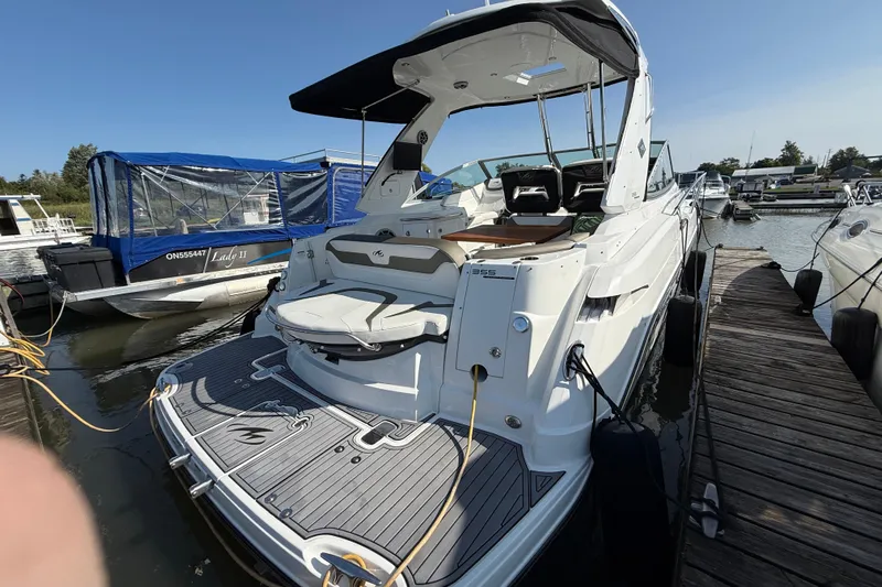  Yacht Photos Pics 2018 Monterey 355 Sport Yacht docked at marina, rear view.