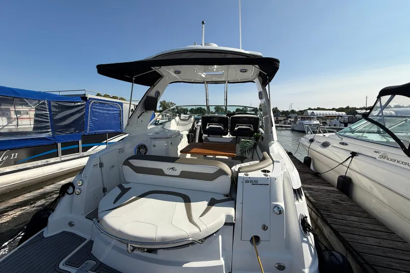  Yacht Photos Pics 2018 Monterey 355 Sport Yacht docked at marina, showcasing sleek design and spacious deck.