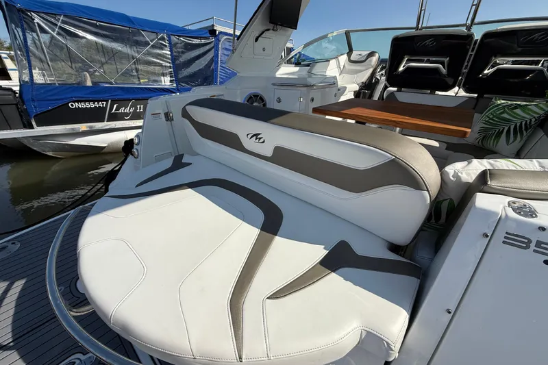  Yacht Photos Pics 2018 Monterey 355 Sport Yacht interior with sleek seating and elegant design.