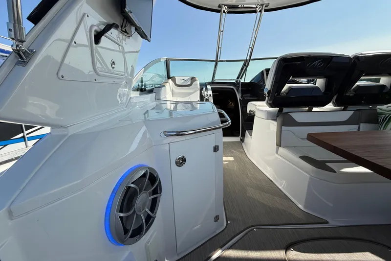  Yacht Photos Pics 2018 Monterey 355 Sport Yacht interior with seating, table, and modern amenities.