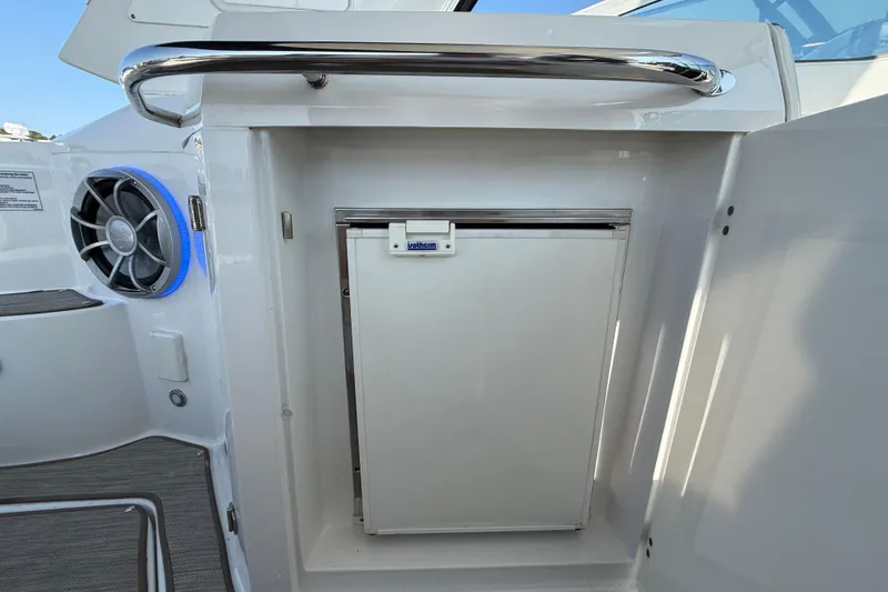  Yacht Photos Pics 2018 Monterey 355 Sport Yacht interior with mini fridge and speaker.