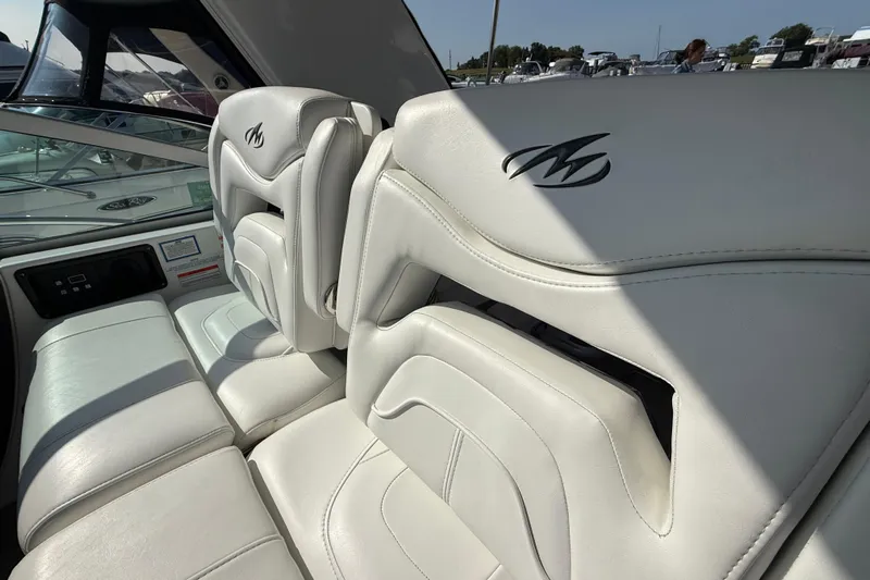  Yacht Photos Pics Luxurious white seating on a 2018 Monterey 355 Sport Yacht, featuring elegant design and comfort.