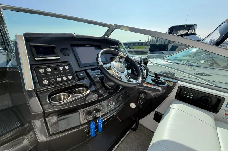  Yacht Photos Pics 2018 Monterey 355 Sport Yacht helm with modern controls and navigation system.