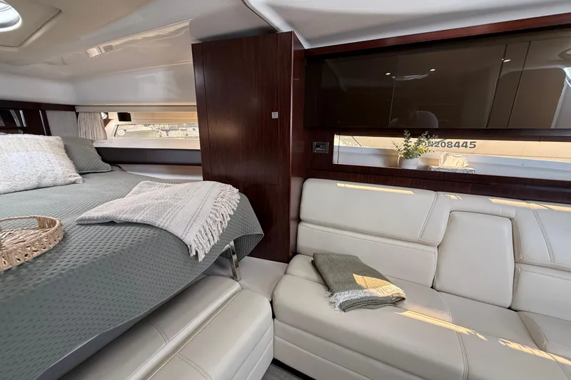  Yacht Photos Pics Luxurious interior of 2018 Monterey 355 Sport Yacht with cozy bed and elegant seating.