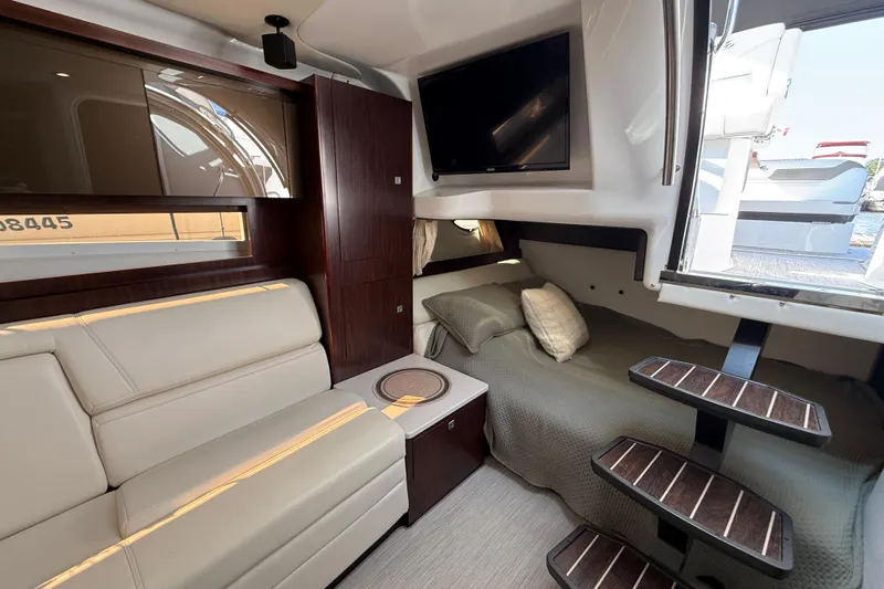  Yacht Photos Pics Interior of 2018 Monterey 355 Sport Yacht with modern seating and cozy sleeping area.