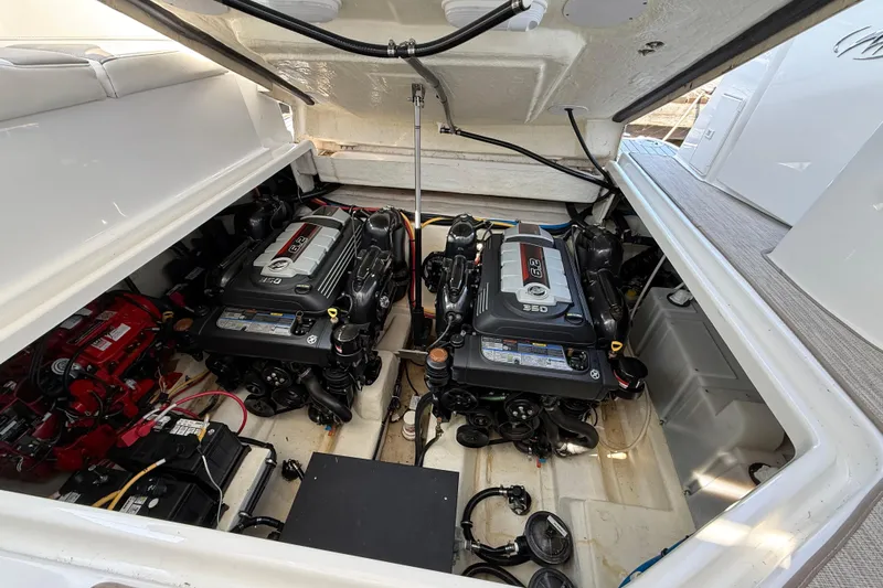  Yacht Photos Pics Engine compartment of a 2018 Monterey 355 Sport Yacht with dual engines and battery setup.