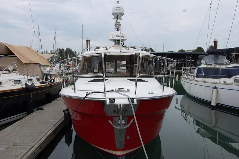  Yacht Photos Pics 2018 Ranger Tugs R29 boat docked at marina, front view with red hull.