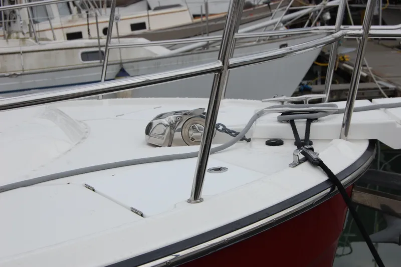  Yacht Photos Pics 2018 Ranger Tugs R29 boat deck with railing and anchor chain at marina.