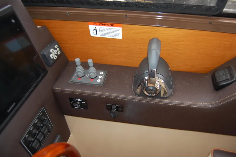  Yacht Photos Pics Control panel of a 2018 Ranger Tugs R29 boat with joystick and throttle.