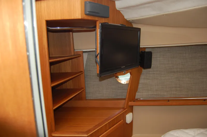  Yacht Photos Pics 2018 Ranger Tugs R29 interior with TV and wooden shelving.