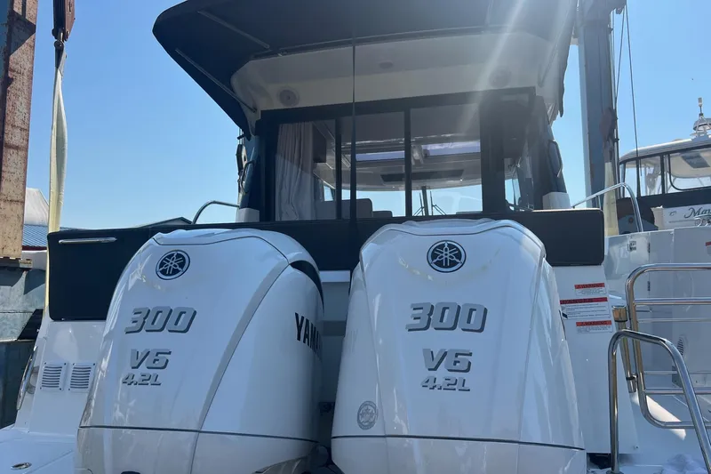  Yacht Photos Pics 2023 Jeanneau NC Weekender 1095 with twin Yamaha 300 V6 outboard engines.