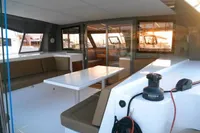 2018 Nautitech 40 Open catamaran interior with seating and table, showcasing modern design.