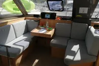 Cozy interior of 2018 Nautitech 40 Open catamaran with seating and table.
