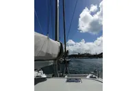 Sailing on a 2018 Nautitech 40 Open catamaran under a bright blue sky.