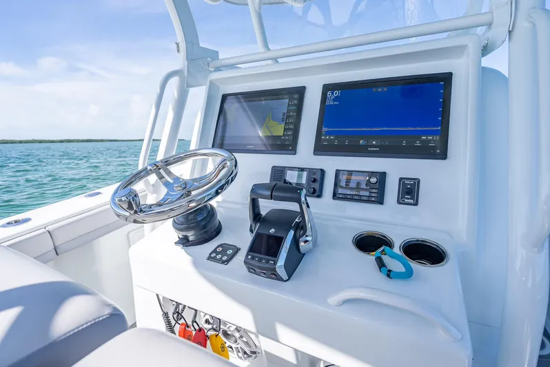  Yacht Photos Pics 2020 Yellowfin 34 boat dashboard with modern controls and dual screens.