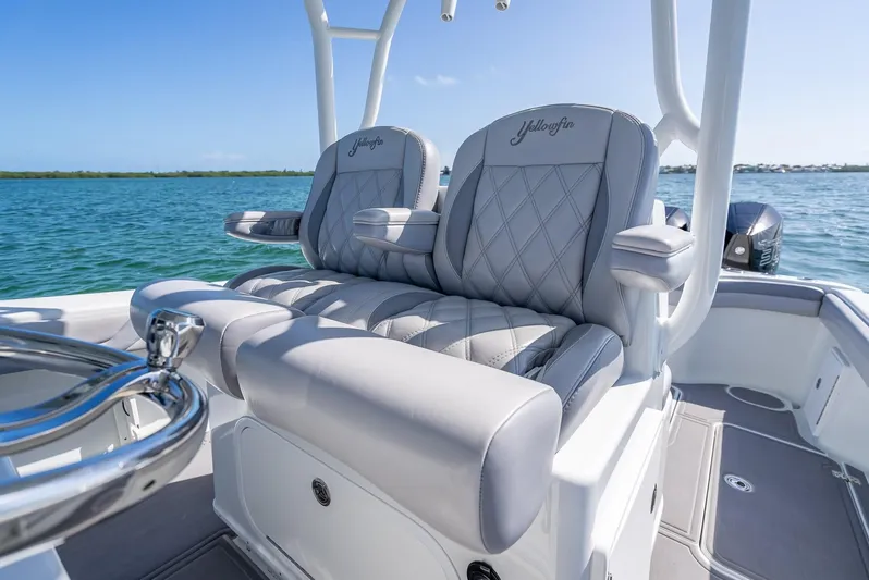 Yacht Photos Pics 2020 Yellowfin 34 boat with luxurious seating on a sunny day.