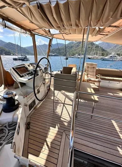  Yacht Photos Pics 2011 Lagoon 560 yacht interior with scenic ocean view and elegant wooden deck.
