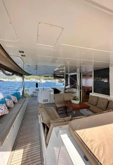  Yacht Photos Pics Spacious deck of 2011 Lagoon 560 yacht with comfortable seating and ocean view.