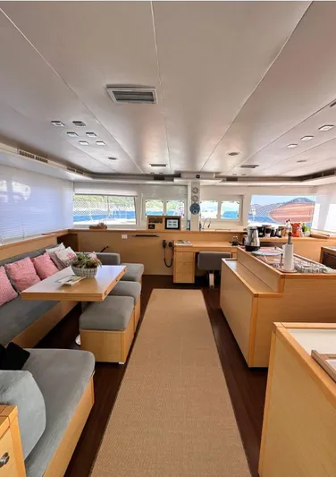  Yacht Photos Pics Interior of 2011 Lagoon 560 yacht with modern seating and dining area.