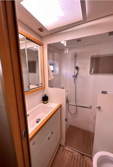  Yacht Photos Pics Bathroom interior of 2011 Lagoon 560 yacht with shower and sink.