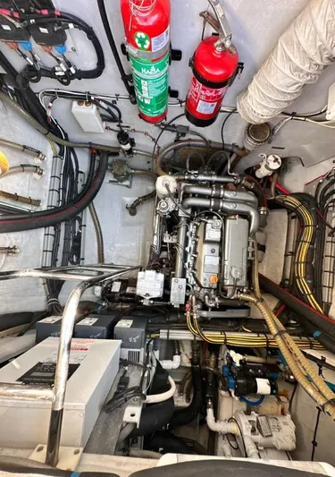  Yacht Photos Pics Engine room of a 2011 Lagoon 560 yacht with fire extinguishers and wiring.