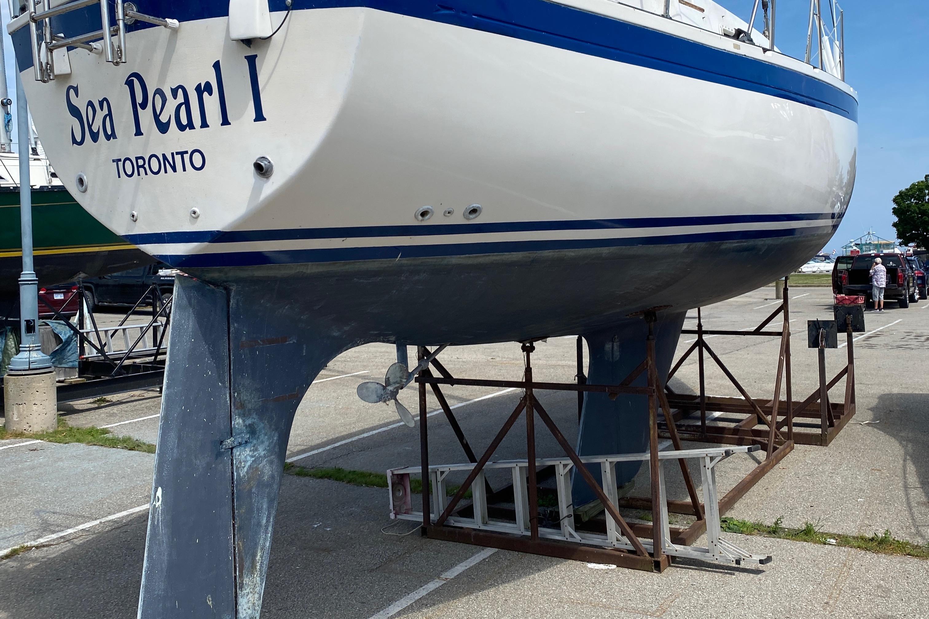 Aloha 34 sailboat "Sea Pearl I" on stands, Toronto, 1985 model.