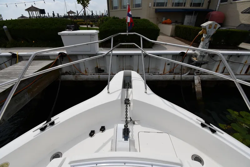 Lady Louise Yacht Photos Pics 2000 Silverton 392 Motor Yacht docked at marina, view from bow.