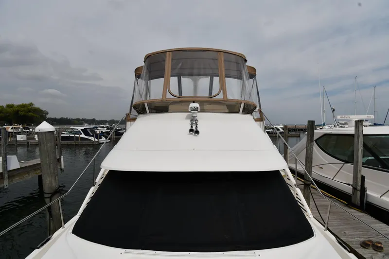 Lady Louise Yacht Photos Pics 2000 Silverton 392 Motor Yacht docked at marina, front view.